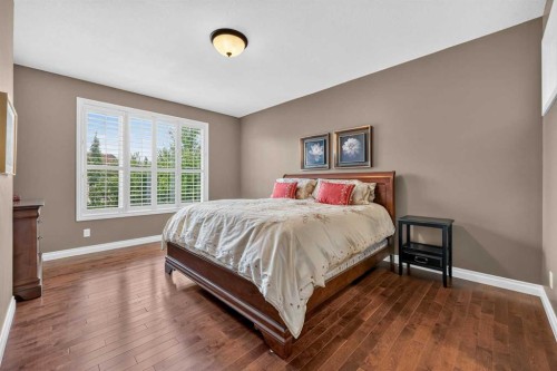66 Evercreek Bluffs View Sw, Calgary, AB - Indoor Photo Showing Bedroom