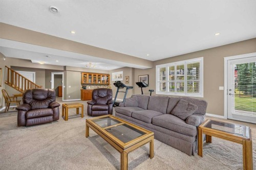 66 Evercreek Bluffs View Sw, Calgary, AB - Indoor Photo Showing Living Room