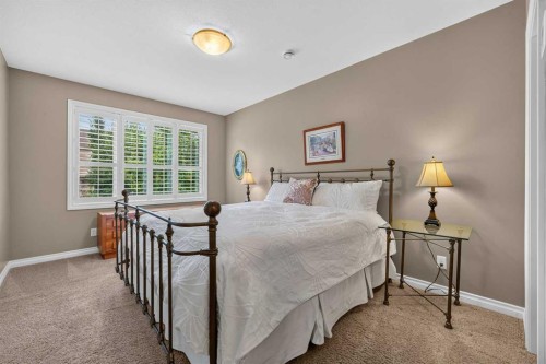 66 Evercreek Bluffs View Sw, Calgary, AB - Indoor Photo Showing Bedroom