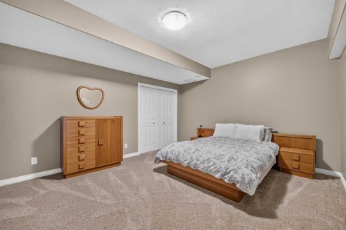66 Evercreek Bluffs View Sw, Calgary, AB - Indoor Photo Showing Bedroom