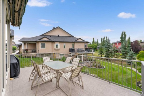 66 Evercreek Bluffs View Sw, Calgary, AB - Outdoor With Deck Patio Veranda With Exterior