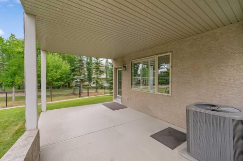 66 Evercreek Bluffs View Sw, Calgary, AB - Outdoor With Deck Patio Veranda With Exterior