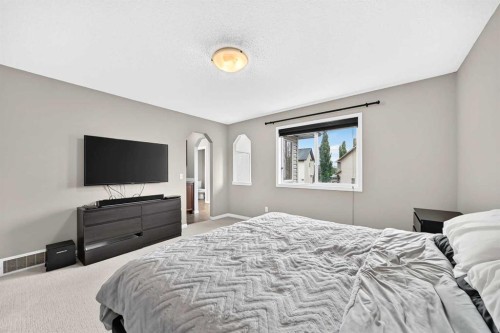 121 Chapalina Heights Se, Calgary, AB - Indoor Photo Showing Bedroom