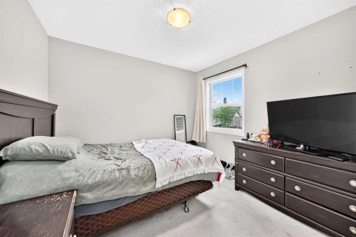 121 Chapalina Heights Se, Calgary, AB - Indoor Photo Showing Bedroom