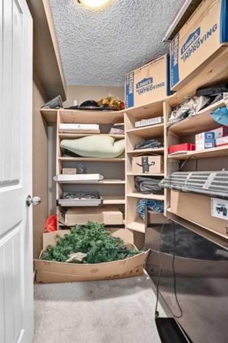 121 Chapalina Heights Se, Calgary, AB - Indoor With Storage