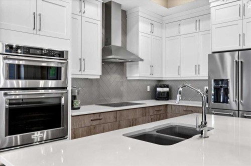 24 Mahogany Gardens Se, Calgary, AB - Indoor Photo Showing Kitchen With Double Sink With Upgraded Kitchen