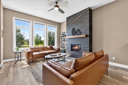 24 Mahogany Gardens Se, Calgary, AB - Indoor Photo Showing Living Room With Fireplace