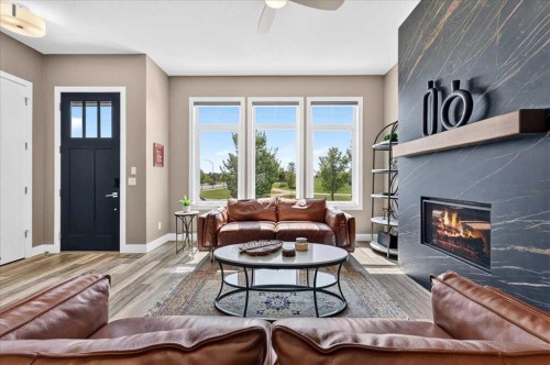 24 Mahogany Gardens Se, Calgary, AB - Indoor Photo Showing Living Room With Fireplace