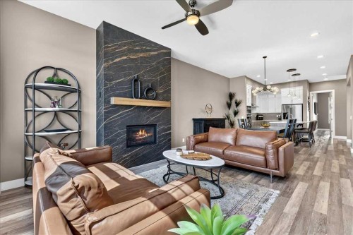 24 Mahogany Gardens Se, Calgary, AB - Indoor Photo Showing Living Room With Fireplace