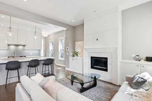 2-1713 36 Avenue Sw, Calgary, AB - Indoor With Fireplace