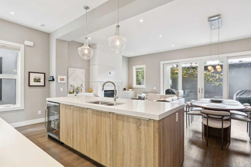 2-1713 36 Avenue Sw, Calgary, AB - Indoor Photo Showing Kitchen With Double Sink