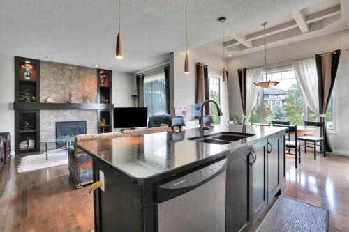 126 Panatella Crescent Nw, Calgary, AB - Indoor Photo Showing Kitchen With Double Sink With Upgraded Kitchen