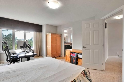 126 Panatella Crescent Nw, Calgary, AB - Indoor Photo Showing Bedroom