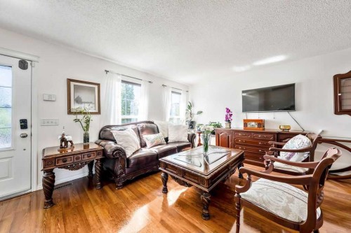 455 Prestwick Circle Se, Calgary, AB - Indoor Photo Showing Living Room