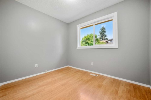 125 Carr Place, Okotoks, AB - Indoor Photo Showing Other Room