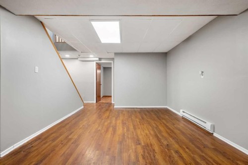 125 Carr Place, Okotoks, AB - Indoor Photo Showing Other Room