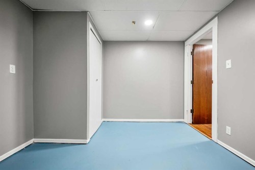 125 Carr Place, Okotoks, AB - Indoor Photo Showing Other Room