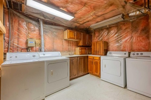 125 Carr Place, Okotoks, AB - Indoor Photo Showing Laundry Room