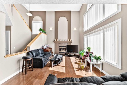 505 Kincora Bay Nw, Calgary, AB - Indoor Photo Showing Living Room With Fireplace