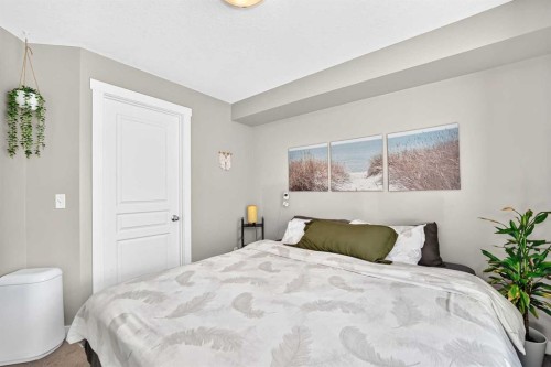 154 Cranford Walk Se, Calgary, AB - Indoor Photo Showing Bedroom