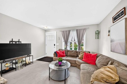 154 Cranford Walk Se, Calgary, AB - Indoor Photo Showing Living Room