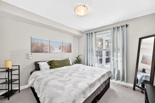154 Cranford Walk Se, Calgary, AB - Indoor Photo Showing Bedroom