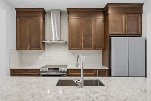 199 Carringham Road Nw, Calgary, AB - Indoor Photo Showing Kitchen With Double Sink With Upgraded Kitchen