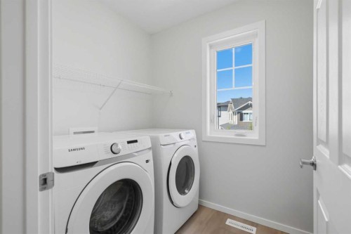 199 Carringham Road Nw, Calgary, AB - Indoor Photo Showing Laundry Room