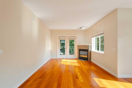 202-509 21 Avenue Sw, Calgary, AB - Indoor With Fireplace