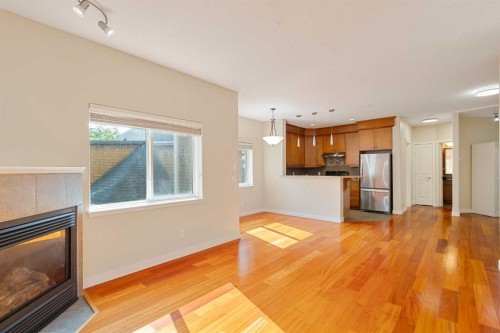 202-509 21 Avenue Sw, Calgary, AB - Indoor With Fireplace
