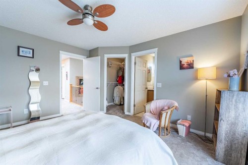 57 Auburn Bay View Se, Calgary, AB - Indoor Photo Showing Bedroom