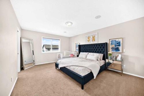 150 Springmere Drive, Chestermere, AB - Indoor Photo Showing Bedroom