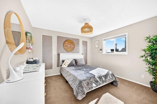 150 Springmere Drive, Chestermere, AB - Indoor Photo Showing Bedroom