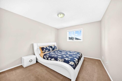 150 Springmere Drive, Chestermere, AB - Indoor Photo Showing Bedroom