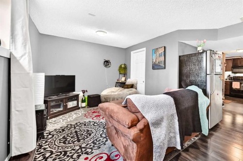 150 Springmere Drive, Chestermere, AB - Indoor Photo Showing Bedroom