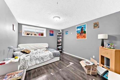 150 Springmere Drive, Chestermere, AB - Indoor Photo Showing Bedroom