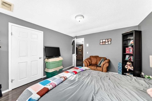 150 Springmere Drive, Chestermere, AB - Indoor Photo Showing Bedroom