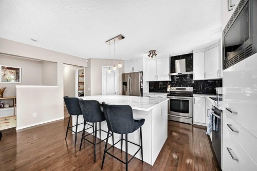 150 Springmere Drive, Chestermere, AB - Indoor Photo Showing Kitchen With Stainless Steel Kitchen With Upgraded Kitchen