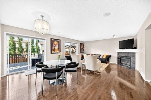 150 Springmere Drive, Chestermere, AB - Indoor Photo Showing Other Room With Fireplace