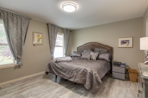 218 Springbank Villas Sw, Calgary, AB - Indoor Photo Showing Bedroom