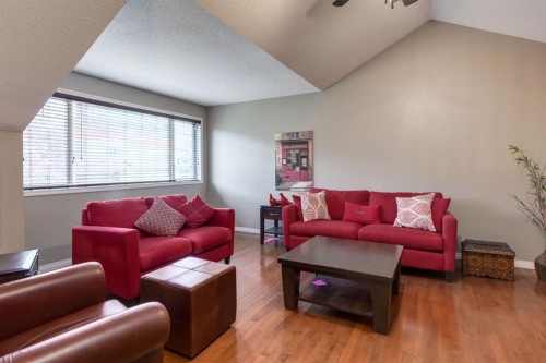 218 Springbank Villas Sw, Calgary, AB - Indoor Photo Showing Living Room