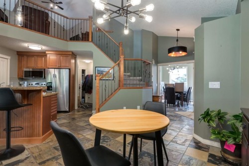 218 Springbank Villas Sw, Calgary, AB - Indoor Photo Showing Dining Room
