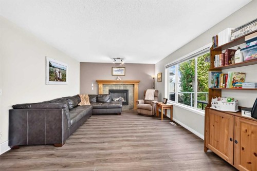 60 Harvest Park Way, Calgary, AB - Indoor Photo Showing Other Room With Fireplace