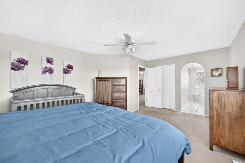 60 Harvest Park Way, Calgary, AB - Indoor Photo Showing Bedroom