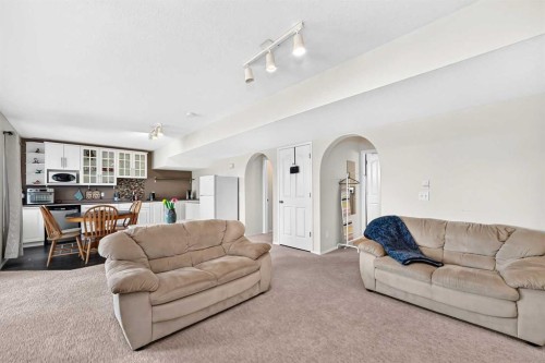 60 Harvest Park Way, Calgary, AB - Indoor Photo Showing Living Room