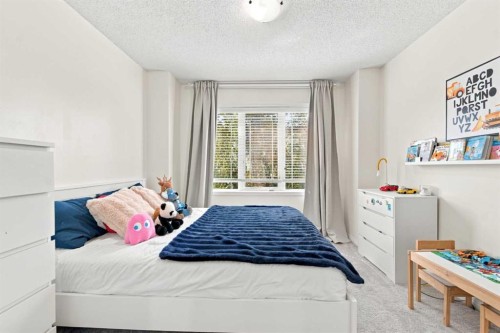 14 Windford Crescent Sw, Airdrie, AB - Indoor Photo Showing Bedroom