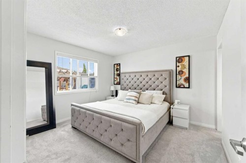 14 Windford Crescent Sw, Airdrie, AB - Indoor Photo Showing Bedroom