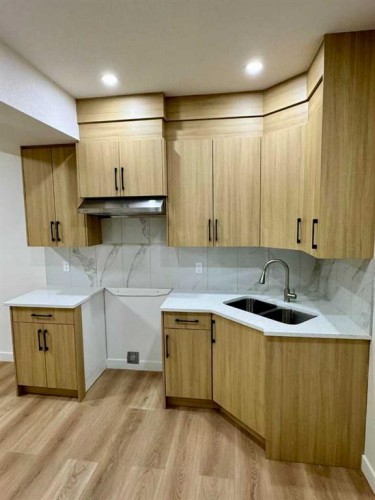 126 Sandpiper Bend, Chestermere, AB - Indoor Photo Showing Kitchen With Double Sink
