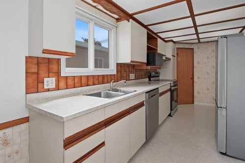 3414 Morley Trail Nw, Calgary, AB - Indoor Photo Showing Kitchen With Double Sink