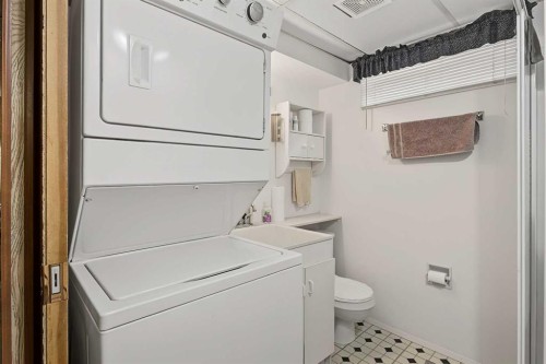 3414 Morley Trail Nw, Calgary, AB - Indoor Photo Showing Laundry Room